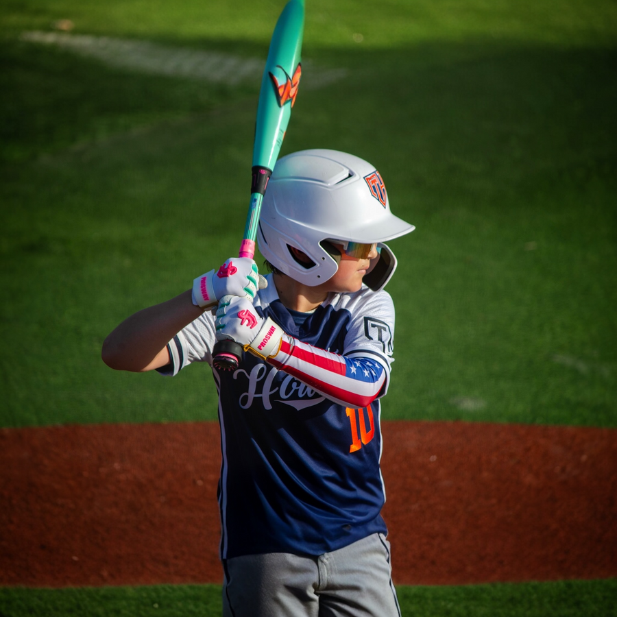 Youth player wearing ProSway batting gloves