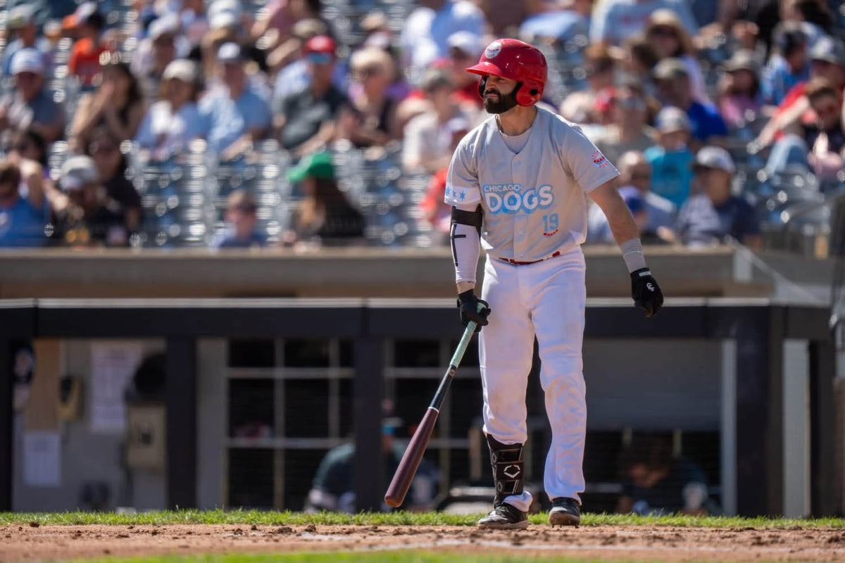 Player wearing ProSway gloves on a baseball field
